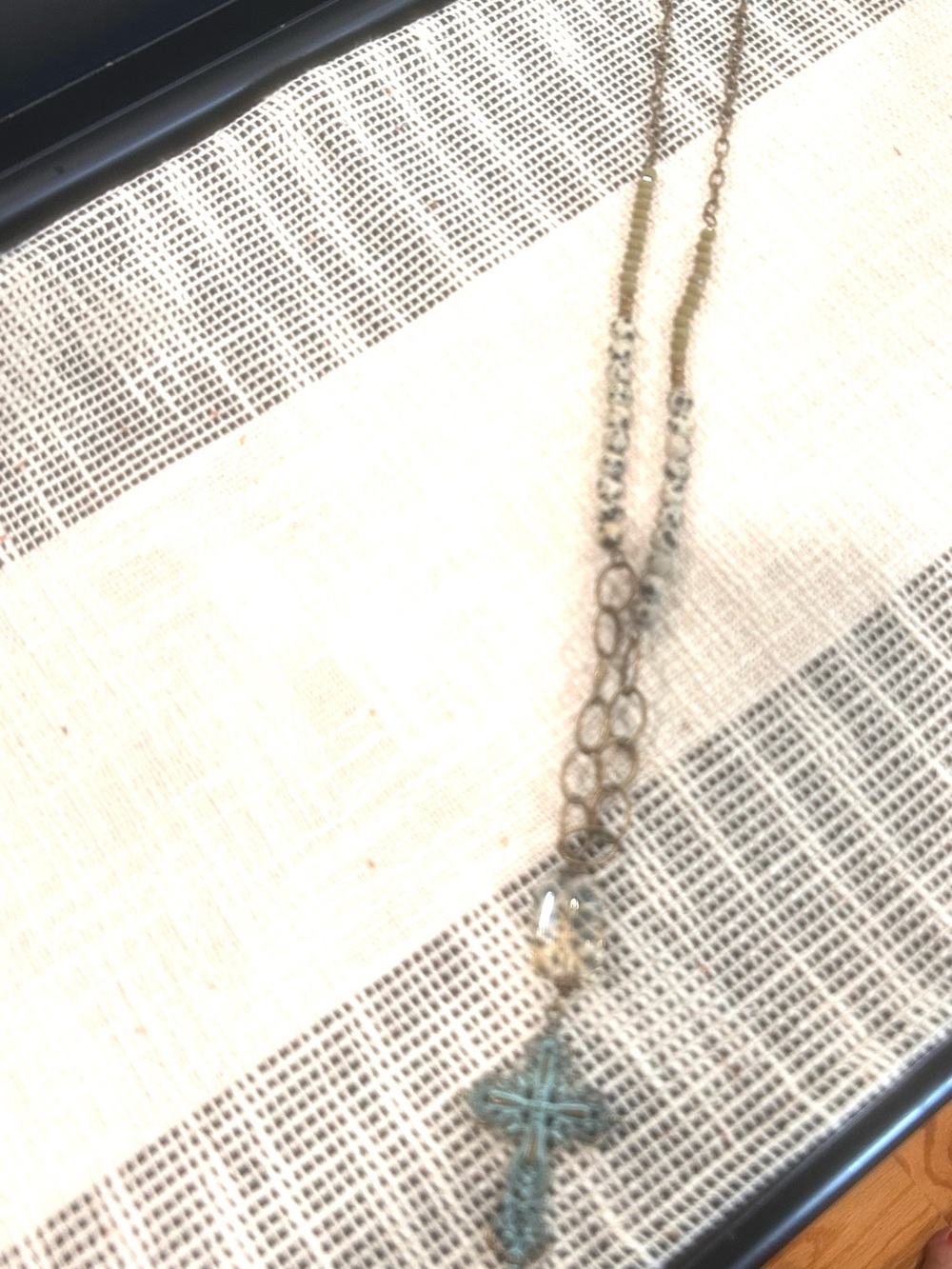 Women’s long length vintage style chain with a turquoise cross.